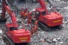 Toll from landslide in southwestern China rises to 11 dead, with 50 people still missing