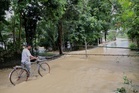 At least 50 people killed and 700,000 displaced by India floods after monsoon rains