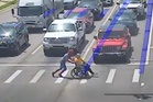 Real-life Spider-Man helps man in wheelchair cross traffic in full superhero costume