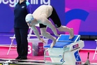 Madeleine McCann’s brother cheered on by parents as he swims in Commonwealth Games final