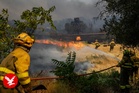 Homes go up in flames as wildfires tear through Spain