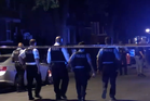 Gunman on the run after bullets rip through Chicago crowd, leaving 2 fighting for life