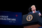 Newsom trolls Trump over his decade-long promise of a new healthcare plan
