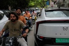Delhi introduces new EV targets to curb air pollution. But some motorists aren’t on board