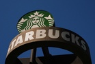 Starbucks reports strong quarterly sales and raises annual outlook