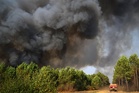 Cooler weather and potential rain move into the French region torched by wildfires