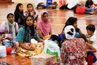 Malaysia begins screening 5,000 refugees for their planned return to Myanmar