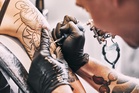 Tech founder responds to backlash after tattooing company logo on potential employees