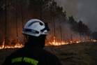 Firefighters battle the last hot spots of a monster wildfire in the southwest