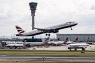 Fire at Heathrow airport leads to runway closure and travel delays
