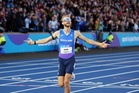 Josh Kerr delights home crowd by claiming Commonwealth gold in mile race