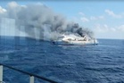 Rescuers race to find survivors after Indonesian ferry fire kills five