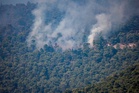 Two dead in Greece helicopter crash during raging wildfires as Briton survives