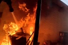 Dramatic bodycam footage shows homes in Washington engulfed by wildfire