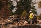 Authorities arrest arson suspect in connection with one of Spokane's devastating wildfires