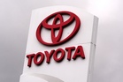 Japan's Toyota reports hefty profit on cheap yen and solid car sales