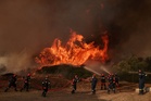 Thousands evacuated in Greece as wildfires burn for a fifth day