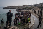 Spanish police ‘identify multiple suspected jihadists’ among 60,000 migrants who stormed border into Ceuta