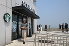 Police raid Starbucks headquarters over disastrous ad campaign
