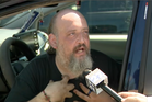 Boy, 11, who was rescued from cage during house fire had locked himself in, father insists
