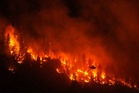 Climate change contributed to big Canada fires, study says as Trump blames mismanagement