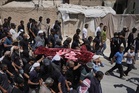 Israeli prosecutors charge a settler in West Bank killing of Palestinian leader Awdah Hathaleen