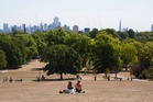 Temperatures rise above 30C while Scotland hit by half month’s rain in two days