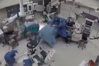 Surgeons risk lives to shield patients during Japan earthquake