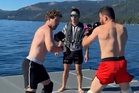 Shirtless Mark Zuckerberg spars with UFC champion in middle of lake