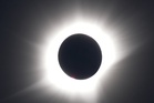 First solar eclipse photos as spectacular display plunges parts of the globe into darkness
