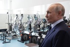 Japan strongly protests Putin’s first visit to disputed islands as Russian president tours fish factory