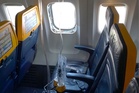 Ryanair window was shattered by engine part before man was nearly sucked out of plane