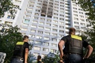 Residents jump from windows as fire spreads in Berlin high-rise building