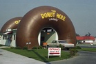 Pull up to the window, please, for a glimpse of an American icon: The drive-thru