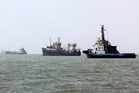 Trump threatens to claim Strait of Hormuz as US territory as Iran hits back