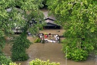 Historic flooding prompts evacuations and water rescues in Indiana