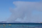 Two dead as fast-moving wildfires sweep Greek island of Salamina with residents preparing to evacuate
