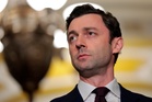 Democrat Jon Ossoff criticises Trump’s focus on personal projects
