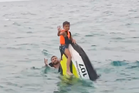 Lost father and sons found clinging to half-sunken jetski after 16 hours at sea