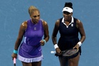 Serena and Venus Williams beaten in thriller on return to doubles action