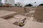 Archaeologists in Peru unearth ancient human skeleton at base of pyramid