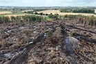 Aerial photos show devastating aftermath of Holme Fen blaze as firefighters remain after 11 days