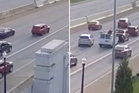 Driver causes chaos after stopping car in middle of highway before driving off after crash