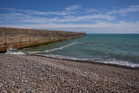 Father, mother and daughter who died after entering water off Sussex named