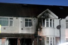 Murder probe continues after London house fire kills woman and injures eight