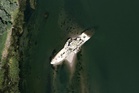 Sunken WWII tugboat emerges as extreme heat empties Europe’s rivers