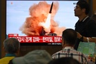 Why has North Korea fired a barrage of ballistic missiles?