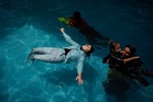 Palestinian children who lost limbs in the Israel-Hamas war learn to swim in Gaza