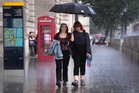 Flash flood warnings for UK as heavy rain batters drought-hit ground