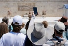 Athens has a new must-have souvenir as the city gets busier and hotter